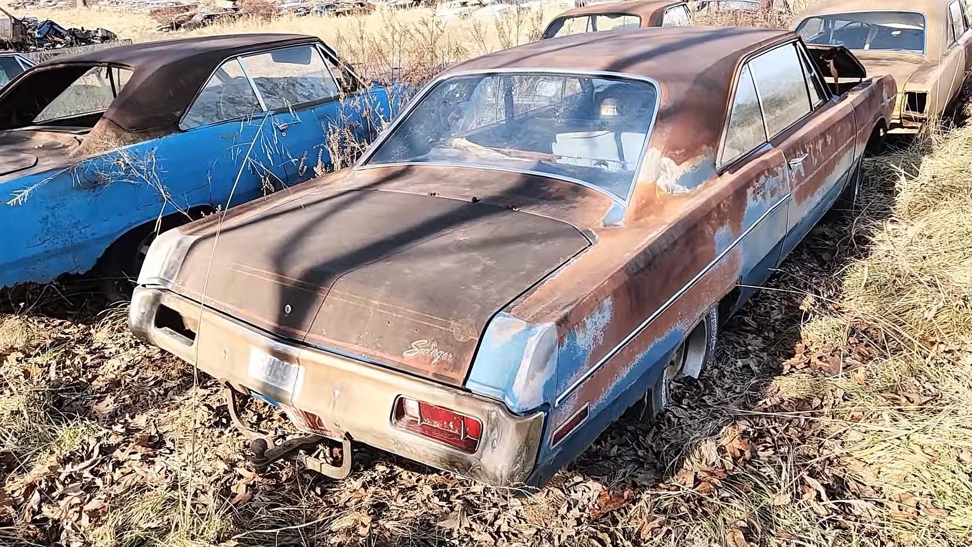 Worlds Rarest 1970 Dodge Dart Is a Super Swinger Automatic Rotting Away in a Backyard pic photo