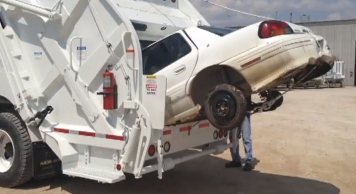 Garbage Truck Crushes a Car