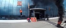 Gas Gas Workers Greet KTM with Burning Tires and a Hanged Mannequin