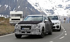 Genesis GV80 Spied Less Disguised in the Alps, Is Towing a BMW X5