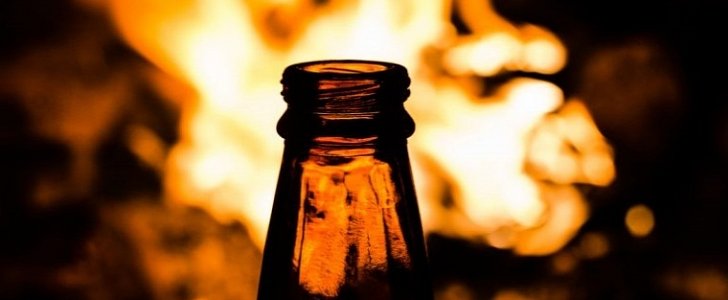 Driver uses beer to put out fire on his engine, saves the car