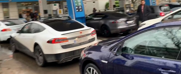 Tesla owners blocking gas station in protest