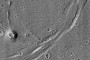 Ghost Crater Shows Skid Mark-Like Features in This Photo From Mars