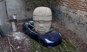 Giant Statue Crushes Tesla Model 3 in Mexico City, but It Was All for Art's Sake