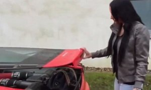 Girl Tries to Use Ferrari Engine Bay as Luggage Compartment, Burns Her Purse