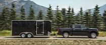 GM Acknowledges Limited EV Towing Range, Patents Assisted Towing Concept