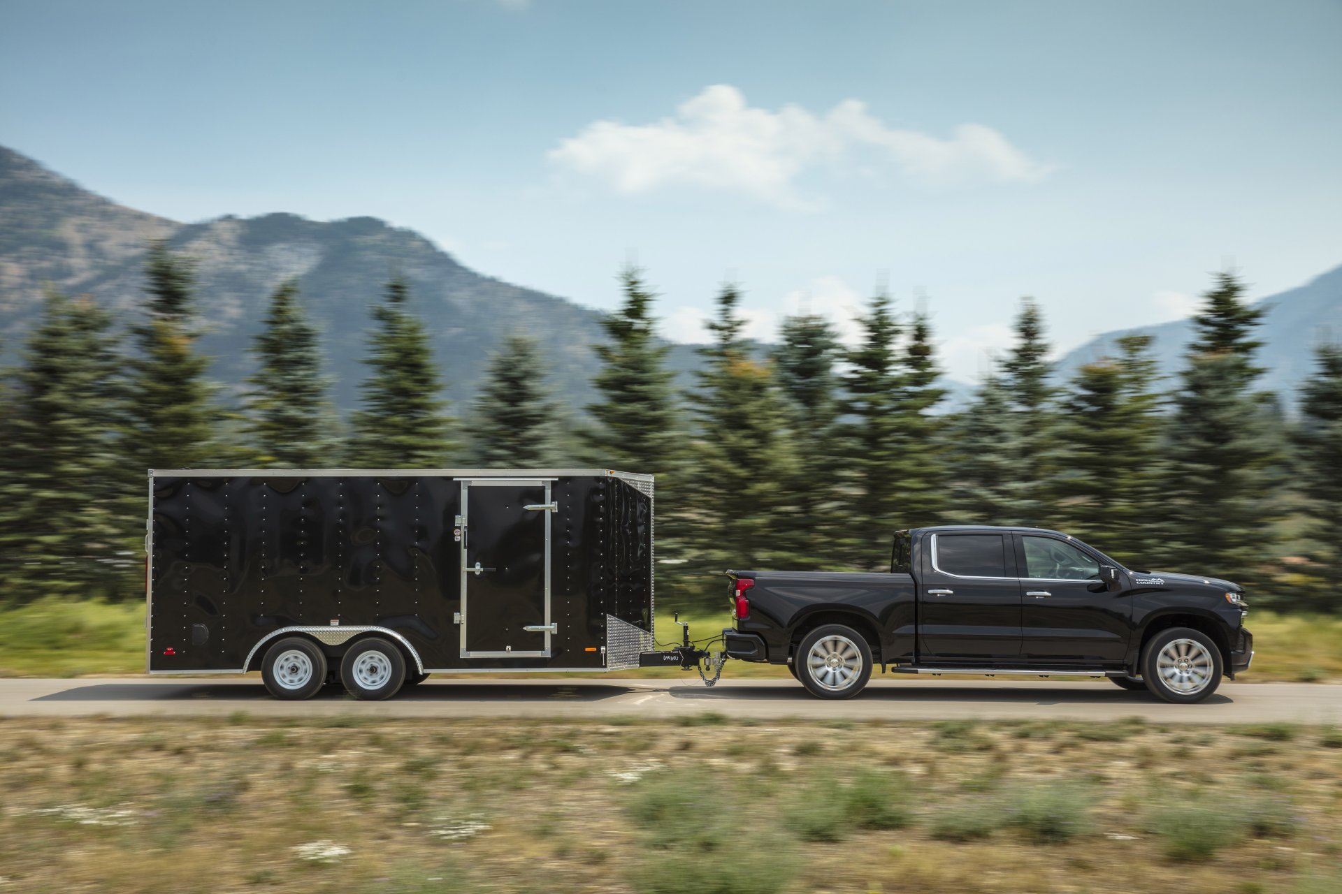 GM Acknowledges Limited EV Towing Range, Patents Assisted Towing
