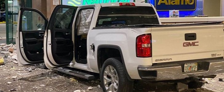 GMC Sierra 1500 smashes through Florida airport at 100mph, stops against concrete counter