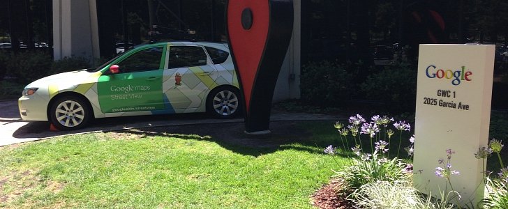 The pin in Google headquarters, next to a Google Maps Street View vehicle