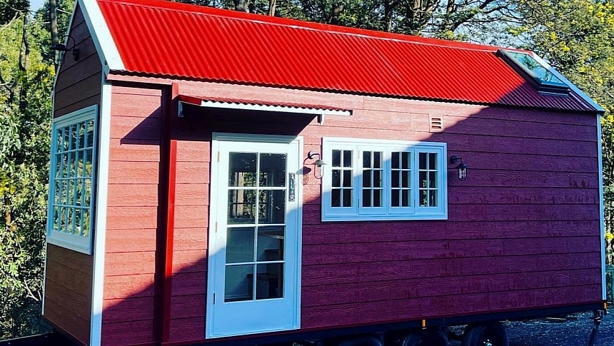 This bright red tiny home is an unusual Scandinavian barn-style abode in Tasmania