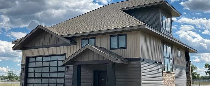 This 2-bedroom house by the Brainerd International Raceway comes with its own auto display