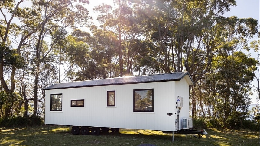 The 9600NLC is a fabulous single-level home on wheels perfectly immersed in nature