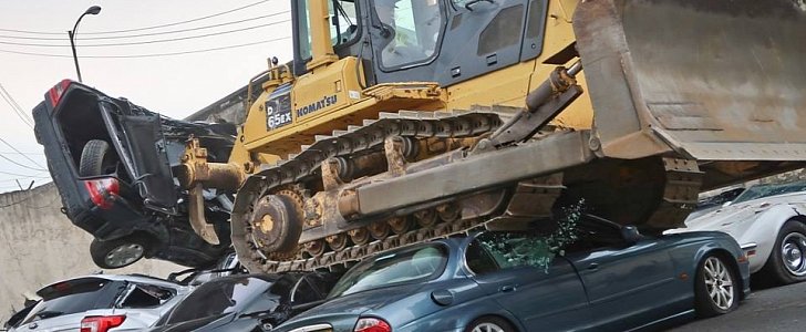 Bulldozer smashes luxury cars in Manila