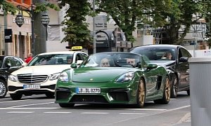 Green Porsche 718 Spyder Spotted in Traffic, Has Satin Aurum Wheels