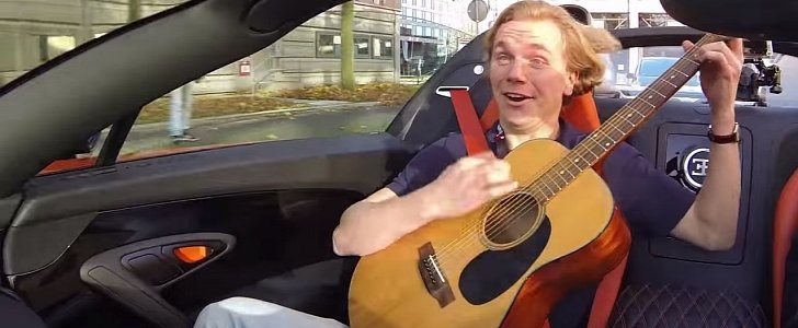 Guy Plays AC/DC on Acoustic Guitar in a Bugatti Veyron Vitesse