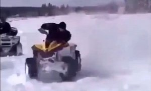 Guy Provokes a Quad ATV to a Rodeo in the Snow, Loses