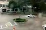 Guy Trying to Drift in a Flooded Roundabout Is Pure Comedy Gold