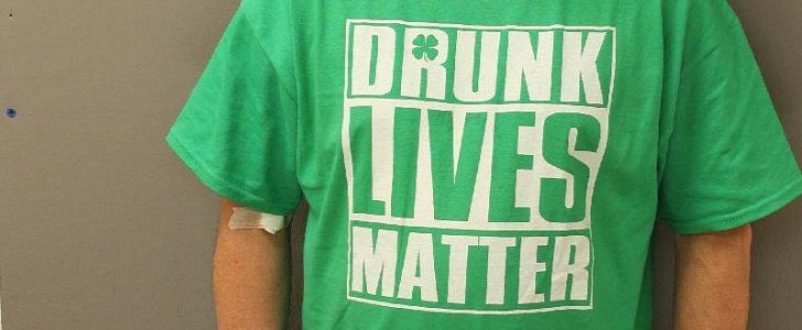Mug shot of man caught driving under the influence wearing a "Drunk Lives Matter" shirt