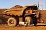Hapless Australian Drives Loaded Mining Truck Over His Own Pickup
