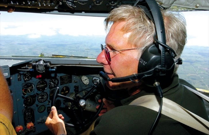 Harrison Ford flying a plane
