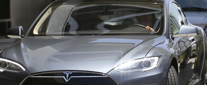 Harrison Ford seen driving his Tesla Model S