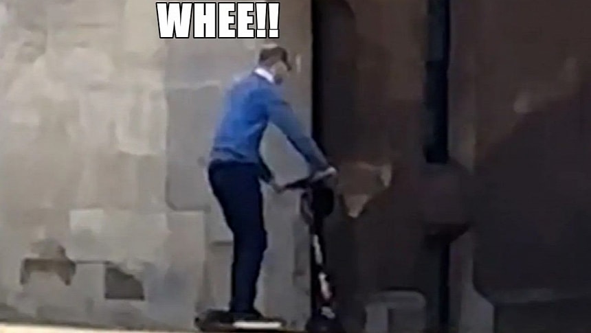 Prince William rides on his e-scooter on Windsor Castle grounds