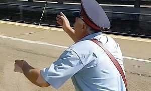 Here’s a Desperate Conductor Being Left Behind by the Engine Driver