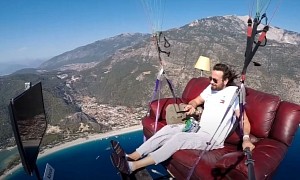 Here’s a Flying Coach Potato: Paraglider Takes Off With His Sofa, Chips, TV