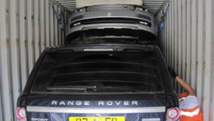 Stolen Range Rovers in a container