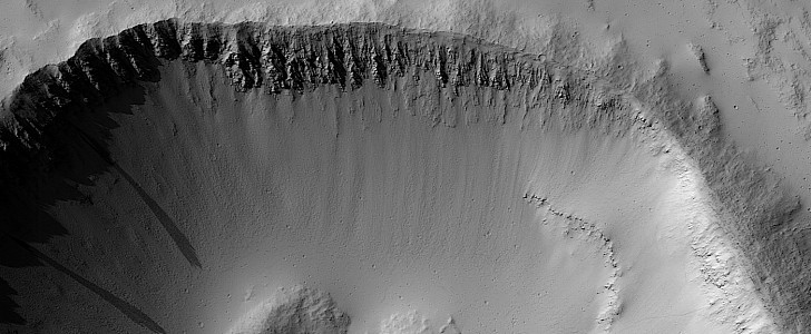 Impact crater on one side of Ascraeus Mons