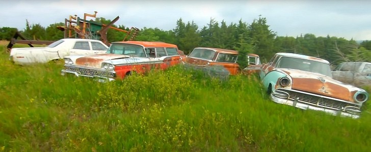 Cars parked in a field