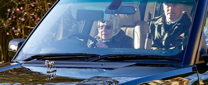 The Queen takes herself for a drive around her estate, in her beloved Range Rover