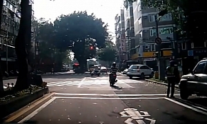 High-Speed Scooter Runs the Red, Crashes Hard