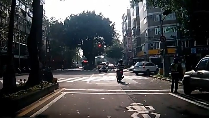 High-Speed Scooter Runs the Red, Crashes Hard