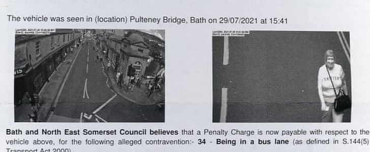 Couple receives fine for driving in the bus lane, based on a photo of a woman in a scripted shirt walking there