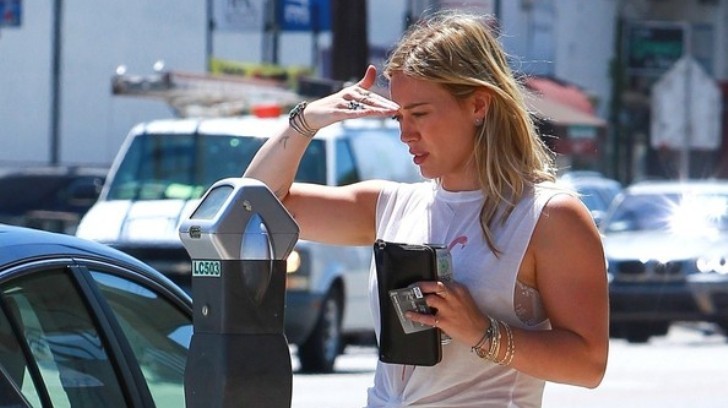 Hilary Duff Parks Her G-Wagon and Pays the Meter