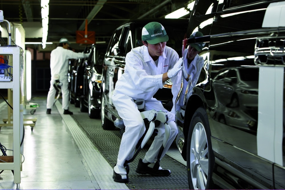 Honda workers testing the device