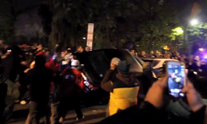 Hooligans Flipping a Toyota Camry After Red Sox World Series Win