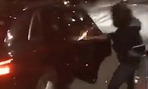 Hooligans Throw Lighted Firework Inside Stationary SUV in London
