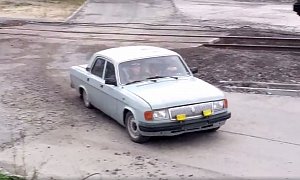 How Many Russian Workers Can You Squeeze into a Russian GAZ Volga?