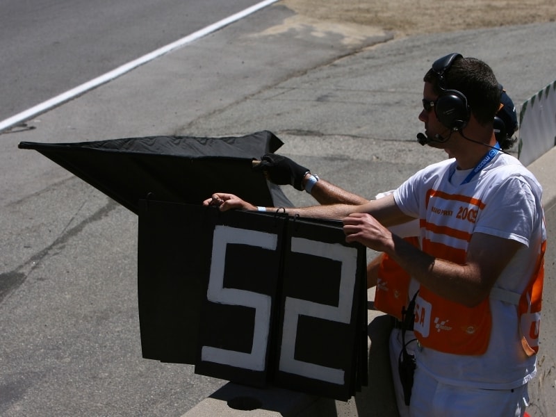 This black flag means rider 52 is disqualified