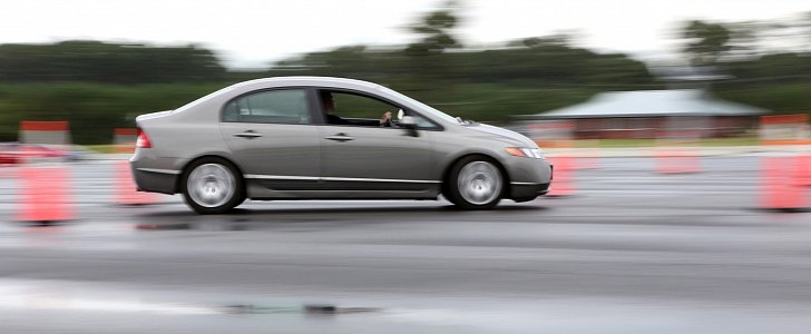 A student maneuvers their vehicle through a defensive driving course aboard Marine Corps Bogue Air Field, N.C.