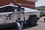 Humanoid Robot Signs Up for Uber With Its Cybetruck, but It's All CGI