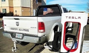 “I Identify as a Prius” Ram Plugged In at Tesla Charger Is Next-Level ICEing