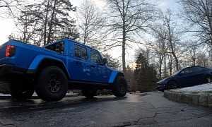 ICE Jeep Gladiator Embarrasses Itself on an Icy Incline in Front of a Tesla Model Y