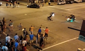 Idiot Rider Fails Rolling Burnout, Hits Pedestrians