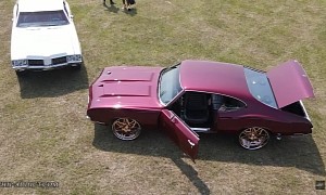 If One 1971 Olds Cutlass on 26s Is not Enough, a Second Burgundy on 24s Does the Trick