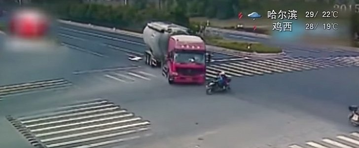 Scooter rider ignores the incoming truck