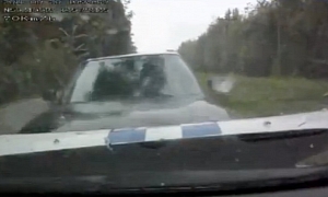 Illegal Overtaking Leads to Police Car Crash