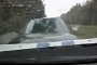 Illegal Overtaking Leads to Police Car Crash